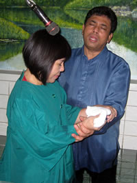 Sister Jojie Afulgencio being baptized